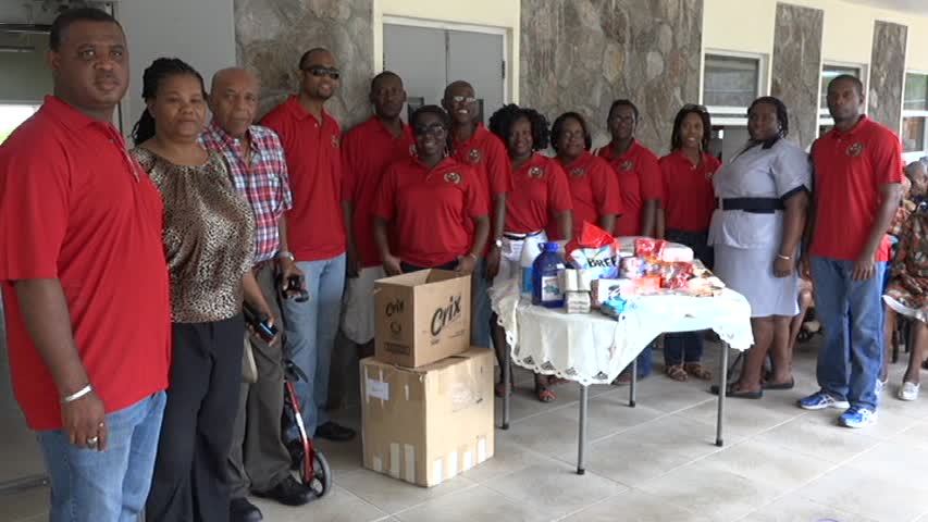 Members of the Cuban Alumni Association with donation to the Flamboyant Nursing home on Nevis on June 20, 2015. (Third and second from left respectively) Association Vice President Retna Walwyn-Browne and Nursing Assistant at the Flamboyant Home Cacelia Stanley and (Second and third from left respectively) Telca Wallace President of the Cuba St. Kitts Nevis Friendship Association and Public Relations Officer Earl Clark
